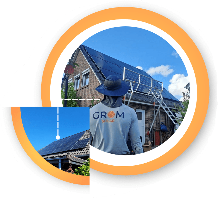 Grom Solar Monteur begutachtet fertig installierte Photovoltaikanlage auf Einfamilienhaus in Schleswig-Holstein